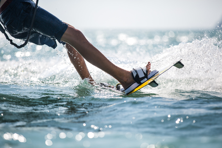 A person enjoys water-sports at the Shark Wake Park A person enjoys water-sports at the Shark Wake Park